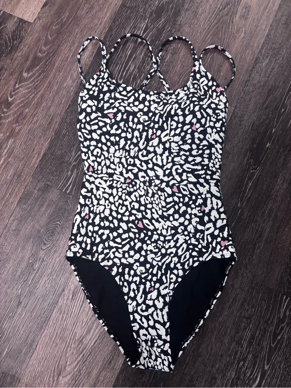 Black and White Leopard Print Bodysuit with Pink Accents sticky pole